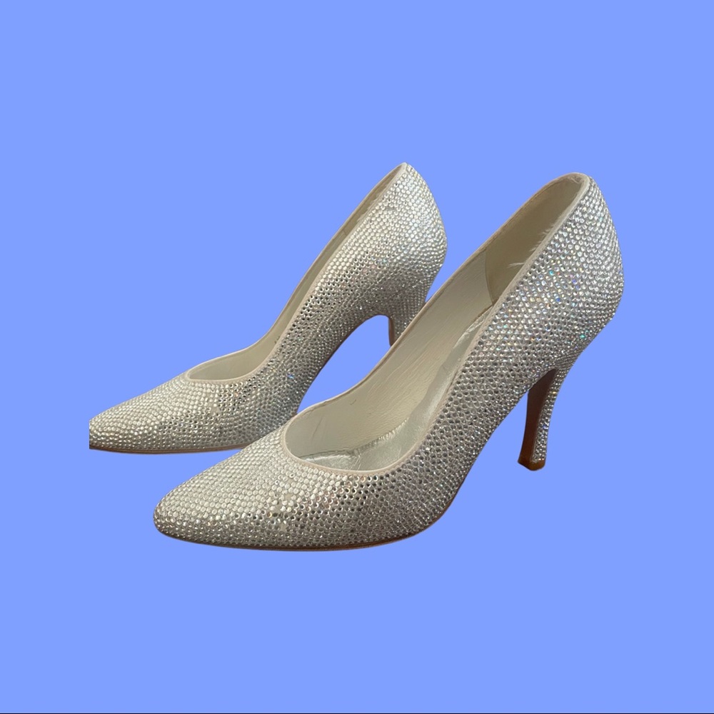 One pair of Stewart Weitzman White Heels